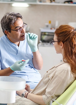 dentist and patient talking