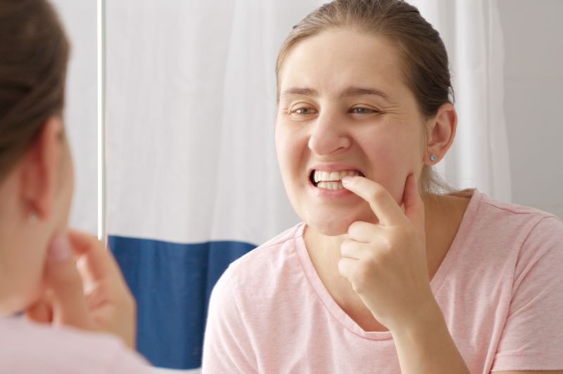 Why Do You Have Bleeding Gums & Bad Breath? Causes, Signs, and What You Can Do